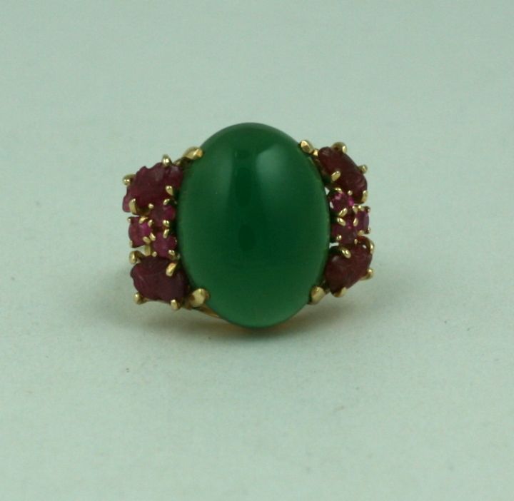Attractive cabochon crysophrase (green onyx) ring with carved ruby 