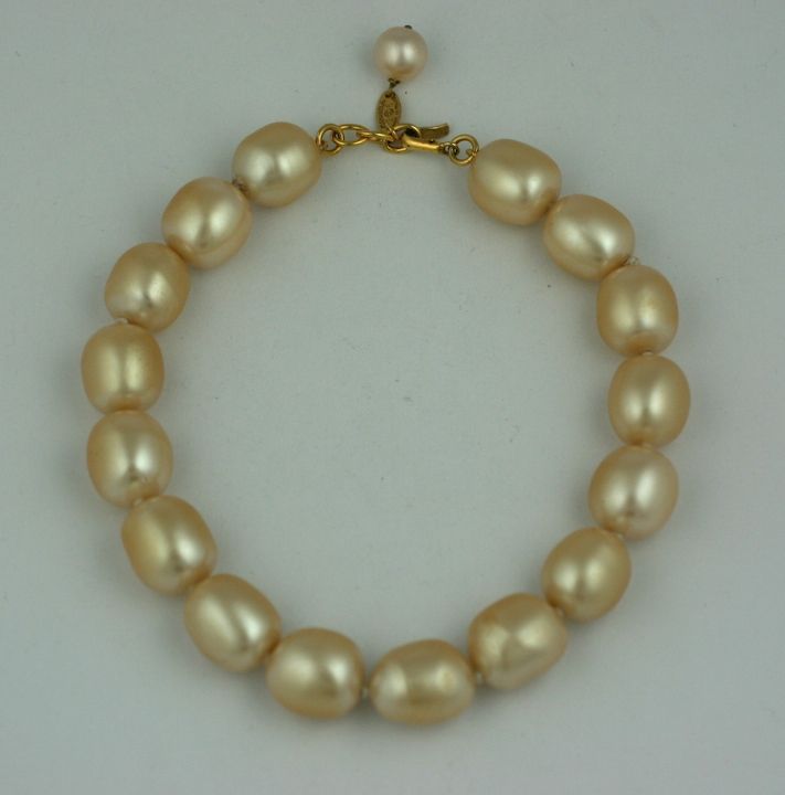 Large oval faux pearl necklace, Chanel Paris. Beautiful quality, hand made by Gripoix, hand knotted with Chanel hang tag. 1980s France.<br />
Pearls 15mm x 20mm.  Length: 14.5-16