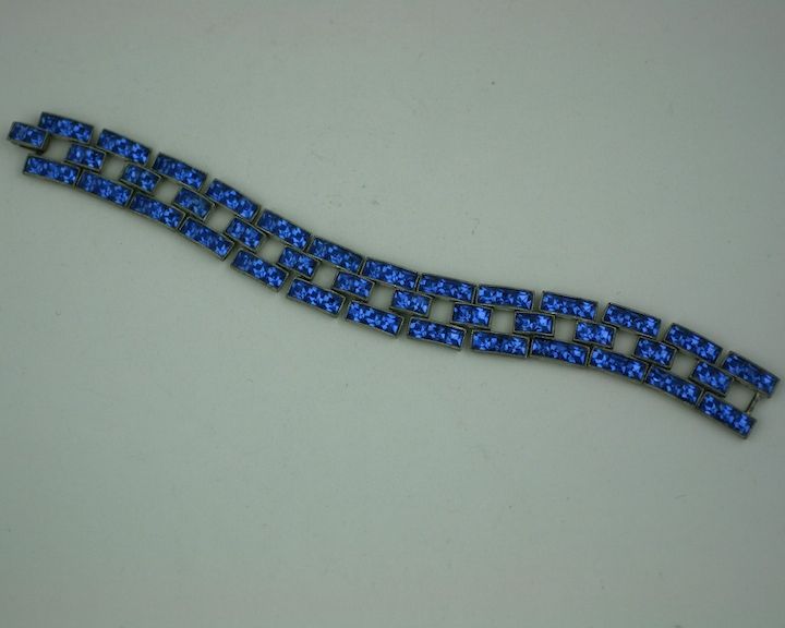 Attractive link bracelet comprised completely of square cut sapphire pastes for that 