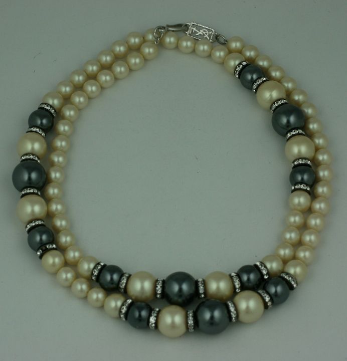 Yves Saint Laurent mixed pearl sautoir with grey and white pearls separated with paste rondels. Can be worn long or doubled. 36