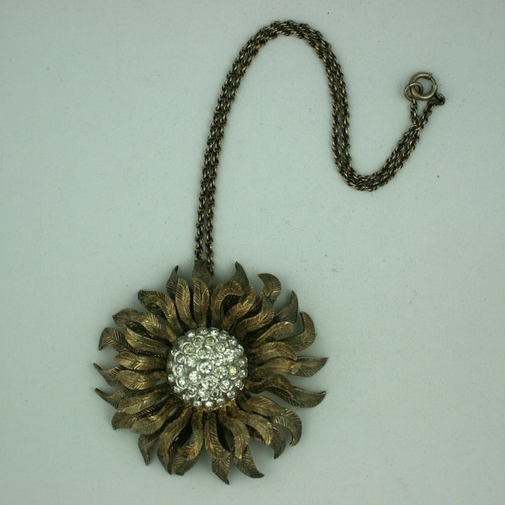 Large sterling gilt sunflower with paste centers by Nettie Rosenstein on twist chain. 1940s American with beautiful detailing.<br />
Excellent condition.