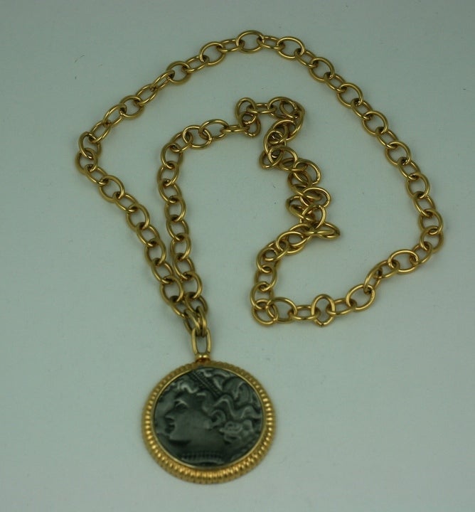 KJL Antique coin pendant on a heavy gold chain. Early KJL mark, 1970s.<br />
Excellent condition.