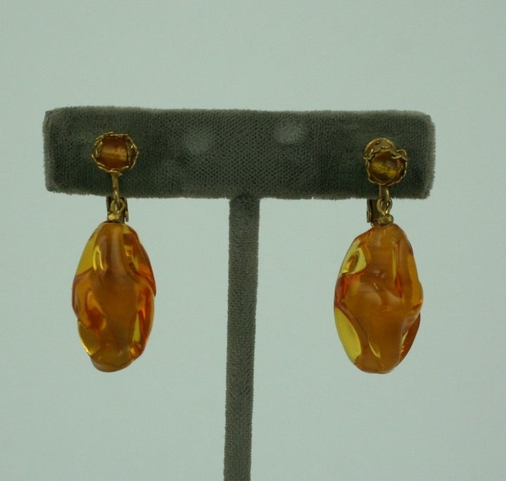 Miriam Haskell earrings of hand made topaz pate de verre large and small beads set in signature russian gold. Adjustable clip back fittings. Please see matching necklace Item AU120312461216.<br />
Excellent condition.