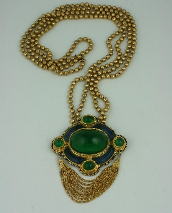 Beautiful pendant necklace by Dior of poured glass stations and cabochons in emerald and sapphire. Executed by the Grosse in Germany for Dior the 1970s, France. Swags of fox chain sway under the pendant which is suspended from a double length