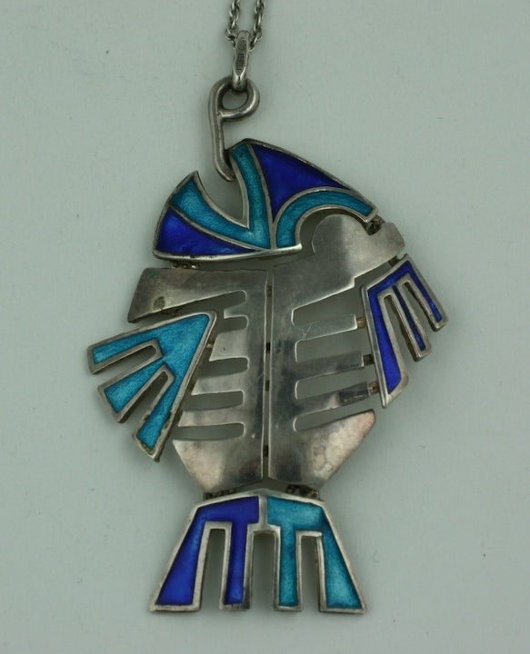 Italian silver fish on hook pendant with varied shades of blue enamel. Articulated to move with wearer. 800 content silver.
1960s Italy.
Excellent condition.