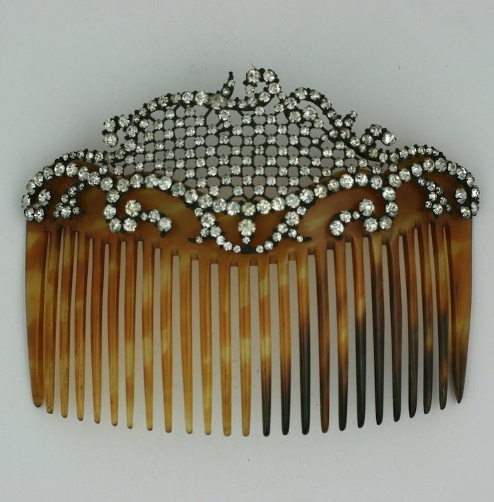 An exquisite Belle Epoque haircomb from about 1890 of fine hand set pastes in a silvered metal  mount.
Excellent condition.