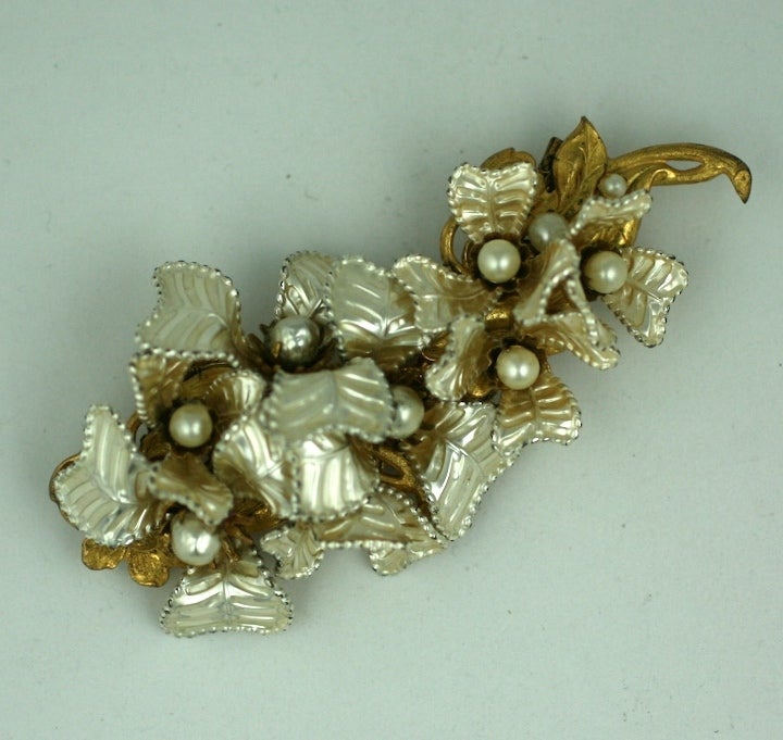 Important Miriam Haskell large spray of hand wired pearlized flower petals, pearls on a signature Russian Gold base. 4.5
