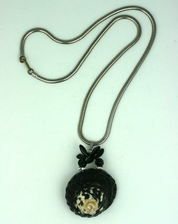 Miriam Haskell's mottled black Turbo shell Pendant with pave rondels and bakelite jet bead spacers on silver fox chain. 1960s USA. 22