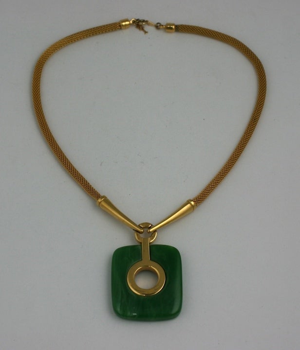 Marbleized green bakelite cushion shaped pendant with gilt fox tube chain, 1970s USA by Trifari. Excellent condition.