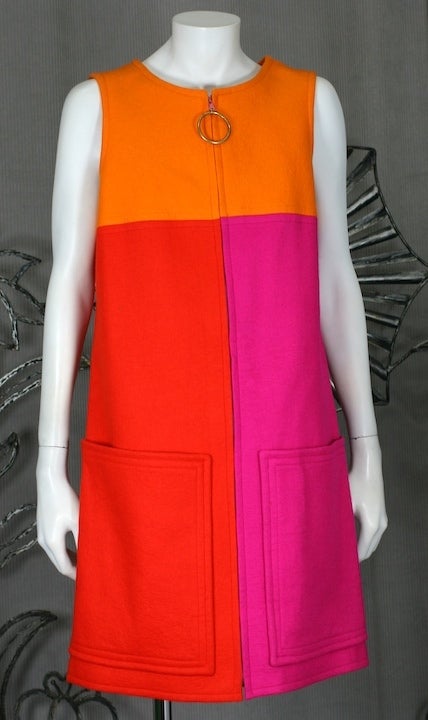 Fun mini dress from the 1960's of color blocked wool felt with easy zip front entry. A line and sleeveless with oversized patch pockets.. Vintage size 10/Modern 8. 33 Length, 36 bust, 44 hip. Excellent condition.
