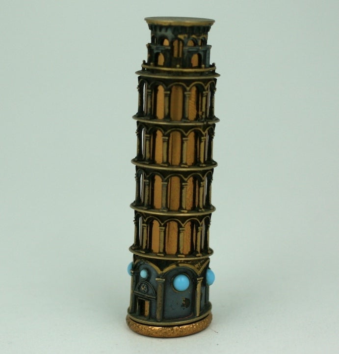 Charming leaning Tower of Pisa lipstick holder, 1950s Italy of silver and gilt metal withe turquoise glass cabochons.
Excellent condition. 3