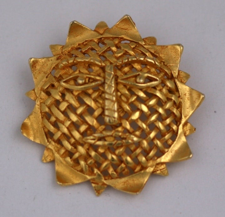 Gilt bronze abstract sun brooch by Dominique Aurientis, Paris 1980s. 2.25