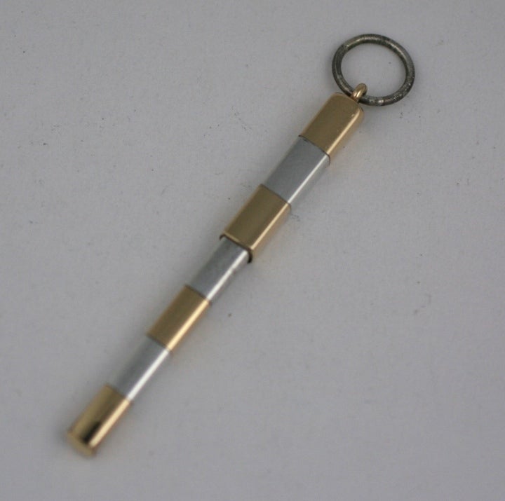 Unusual 2 toned Gucci pendant pen on silver chain. Sterling and gilt sterling are used in a striped layout. Pen unfortunately has no longer any ink, but, still looks great as a pendant. 2.75