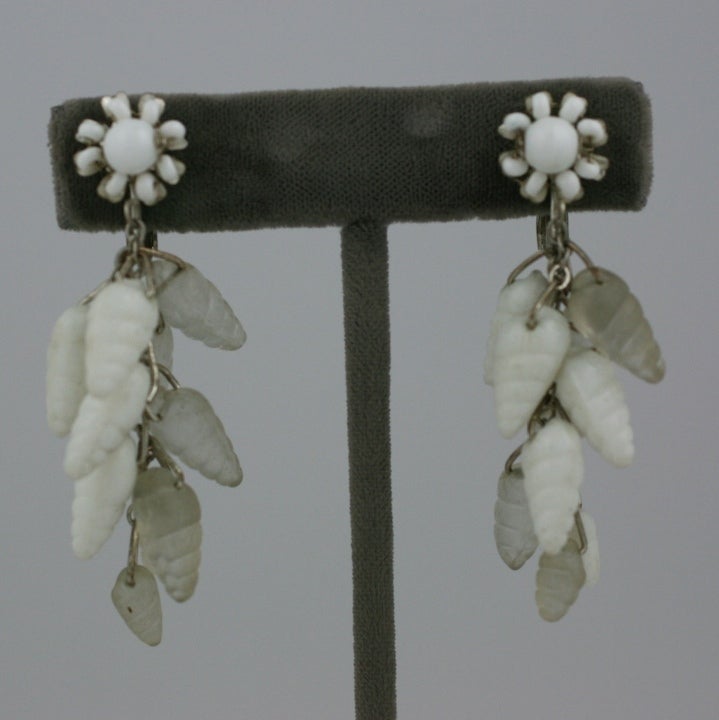Miriam Haskell summer earrings of chalk white and frosted clear glass, suspended from a chalk white  seed bead flower head.
2.25
