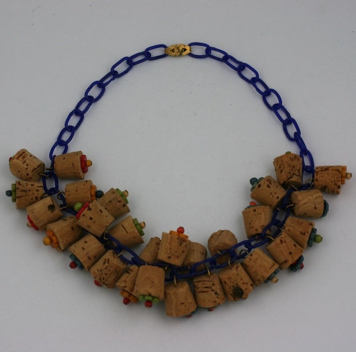Amusing necklace of cobalt blue bakelite chain, natural cork  and multi colored Czech wood flower heads. 1930s USA.  Deco summer jewelry.  16