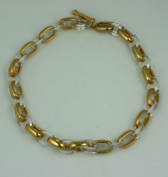 Unusual chain necklace of alternating gilt and lucite links. 1980's USA. Excellent condition. 17
