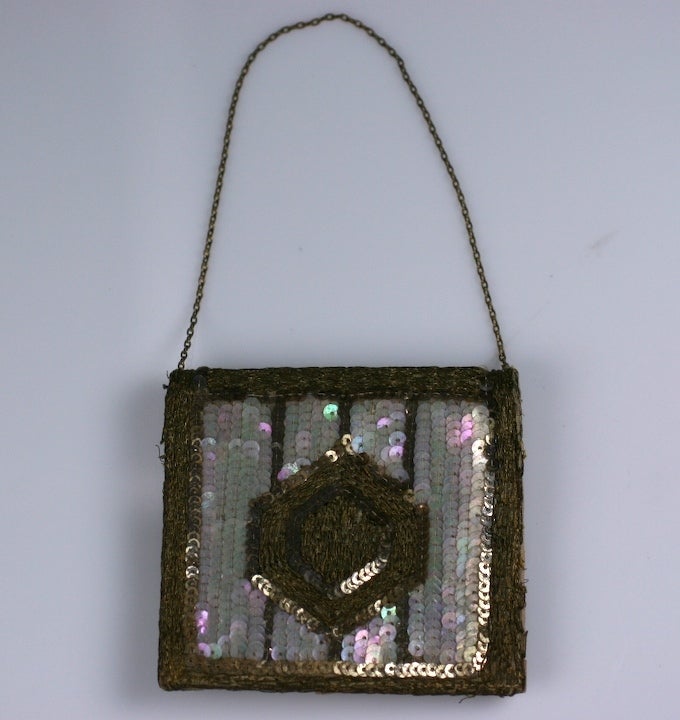 Miniature flapper dance purse of iridiscent sequins with gold tambour embroidery. Inside is a small mirror and pocket. France 1920's. 4