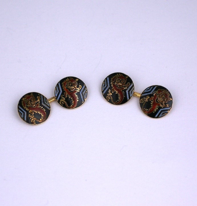 Unusual and attractive art deco cufflinks with Chinese Dragon motifs enameled in oxblood, black and white. France 1930's. Beautiful quality and workmanship.
Excellent condition.