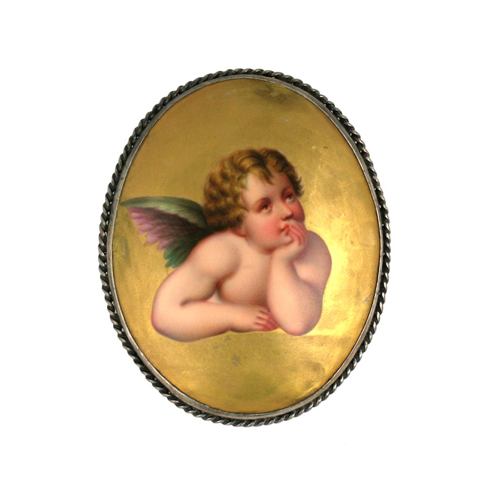 Massive 19th Century Porcelain Putti Brooch For Sale