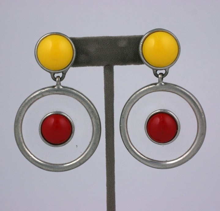 Great looking Ben Amun earrings with colored glass cabochons set onto a floating lucite disc. Polished aluminum finish with clip back fitings. 
Great with this season graphic trends. 1980s USA. 2.75" x 1.75".
Excellent condition.