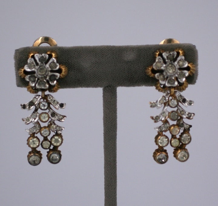 Unusual DeRosa Retro floral earclips of gold washed sterling silver with flowerheads and cascading pave leaves. 
DeRosa jewelry is known for its complex dimensional design, high quality components, translucent enameling and wonderful coloring. Ralph