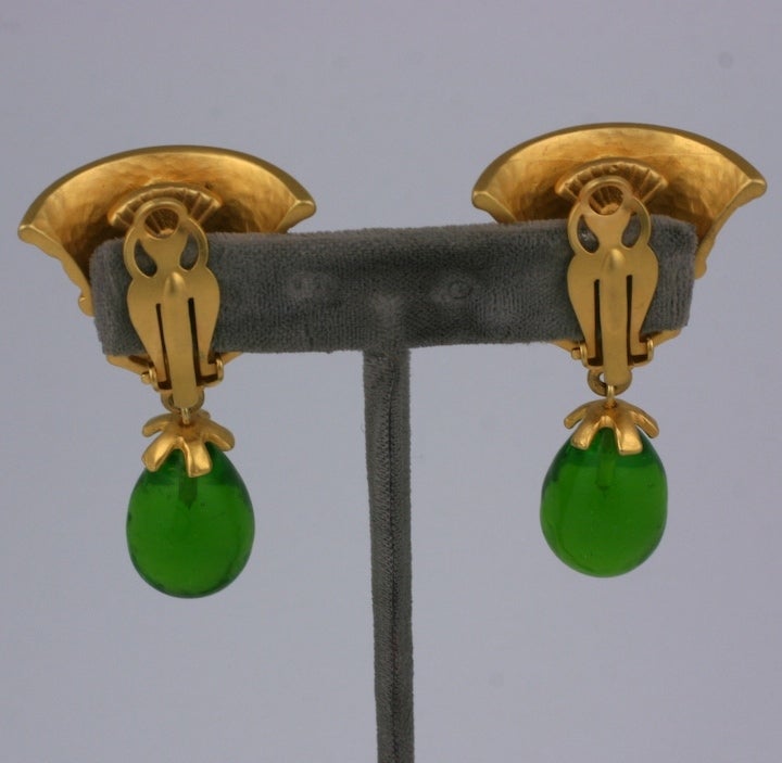 Karl Lagerfeld Eygptian Revival Earrings with emerald pate de verre drops and clip back fittings. Matte gold finish. 1980's France. Excellent condition. 2.25