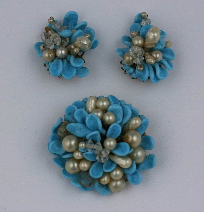Fine Louis Rousselet handmade turquoise, crystal and faux pearl flower form pate de verre brooch and earclips.

 Louis Rousselet (1892-1980) was born in Paris and apprenticed at the tender age of eight to M. Rousseau to master the technique of