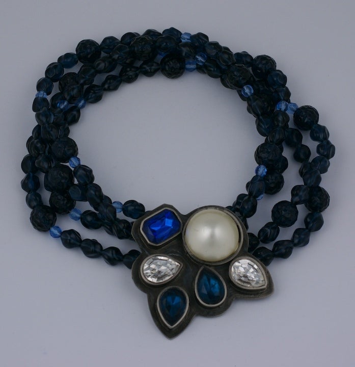 Large scaled necklace of sapphire twist and cut beads with gunmetal clasp set with large pear shaped pastes and faux pearl. USA 1980s. Tess Shalom Desgns. 15