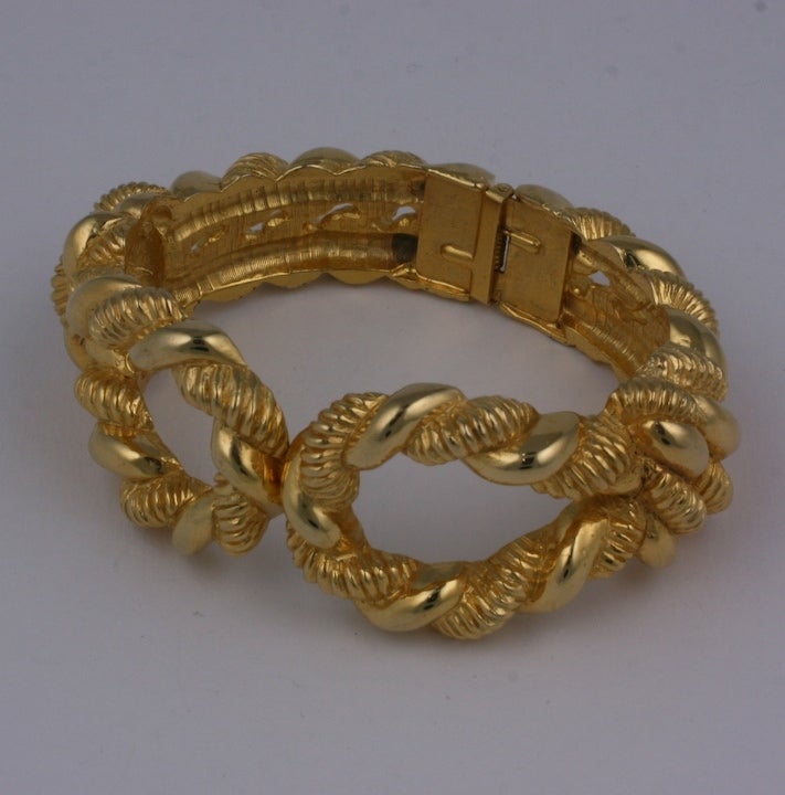 Attractive KJL hinged clamper cuff of twisted gold ropes. Very David Webb in spirit. 1960's USA.  1.25