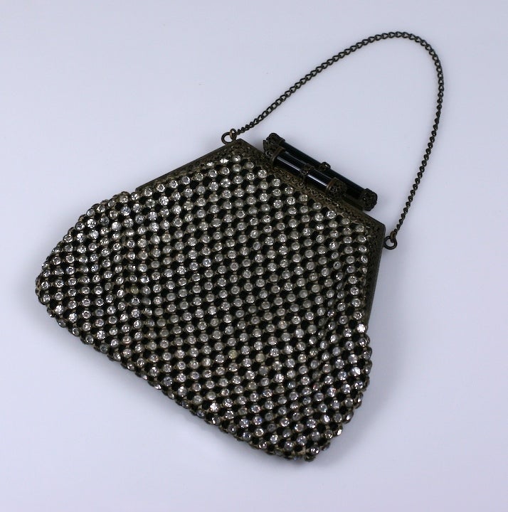 Attractive Paste set evening bag from the 1920's. Each stone is bezel set in metal so a pave mesh 