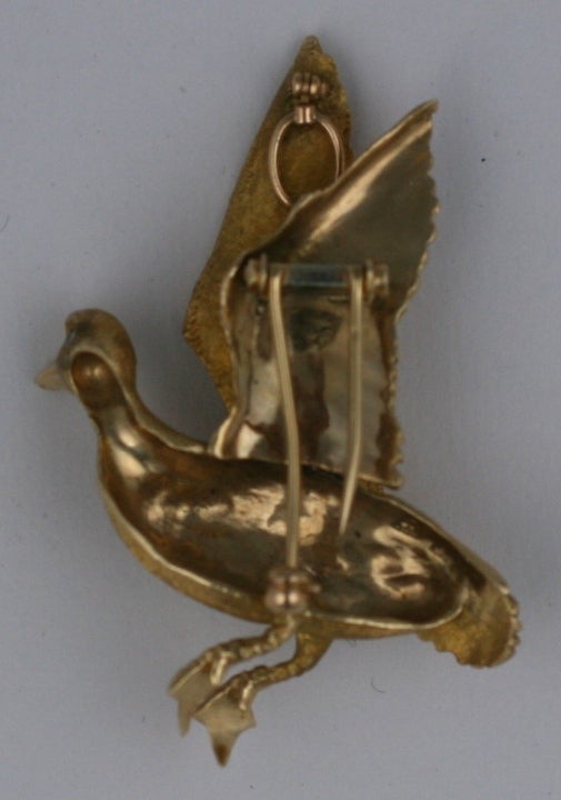 Gold and Diamond Duck in Flight 1