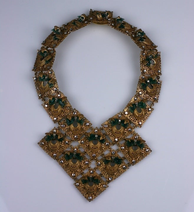 Oversized statement collar by Miriam Haskell of square filigrees set with pastes and green glass 