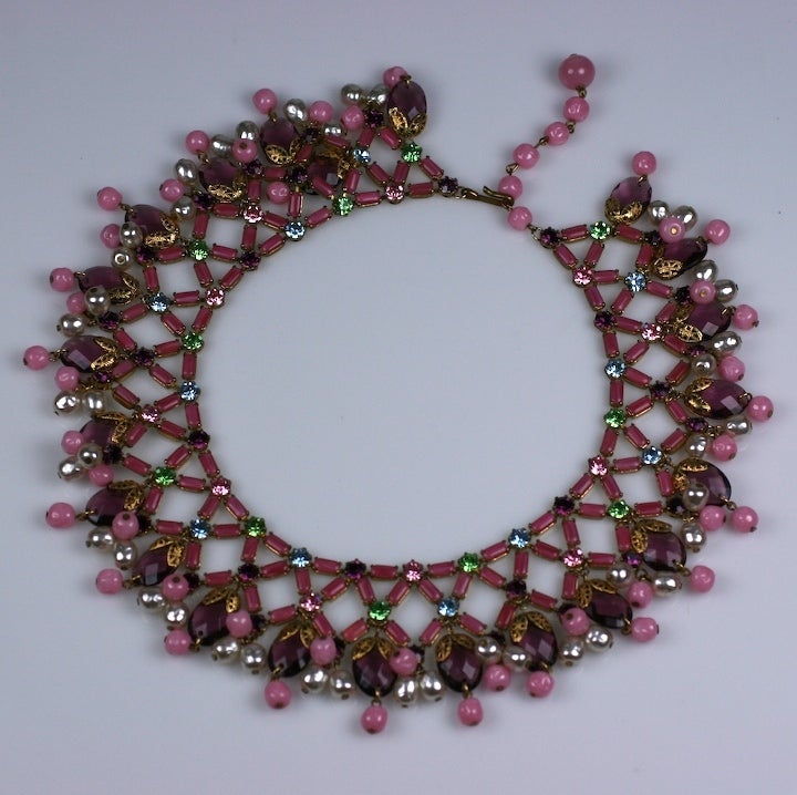 Unusual collar of prong set Swarovski pastel rhinestones mixed with faux pearls, filigrees, faceted and molded pate de verre beads. Impressive size. Collar fits 15