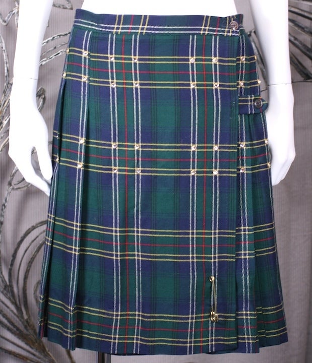 Vintage wool pleated kilt decorated with bezel set Swarovski crystals along the hips. Button front wrap closure. Upcycled and made for a Japan Vogue Shoot x MWLC Studios. 
28