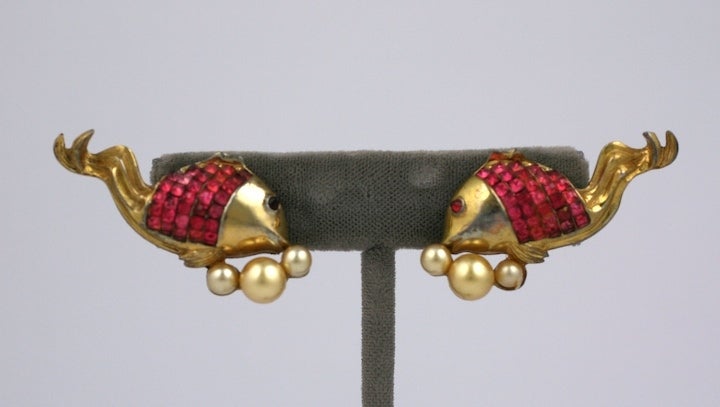 Charming figural Calvaire invisibly set fish earclips with pink faux rubies and faux pearl bubbles. 1930s USA. Unsigned. 1.75