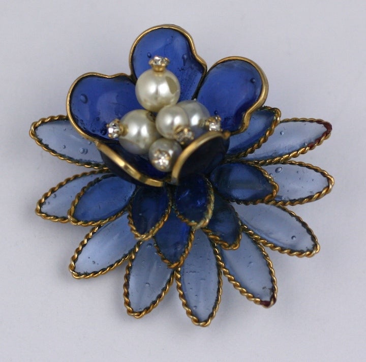 Hattie Carnegie's sapphire and pearl poured glass Gripoix  brooch of a naturalistic water lilly.
2.5