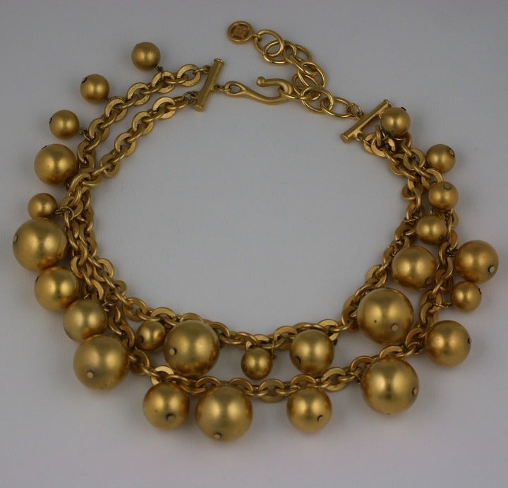 Givenchy matte gold multi charm ball necklace on a double chain. 1980s France. 16