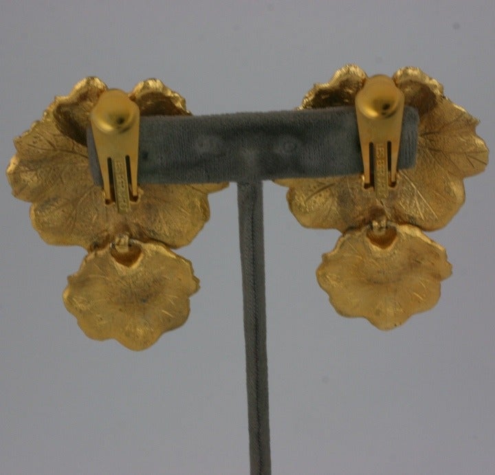 Articulated Leaf Earrings by Les Bernard. Large gold toned clip earrings with bottom leaf dangle. 1980s USA.
Excellent condition. 2.75