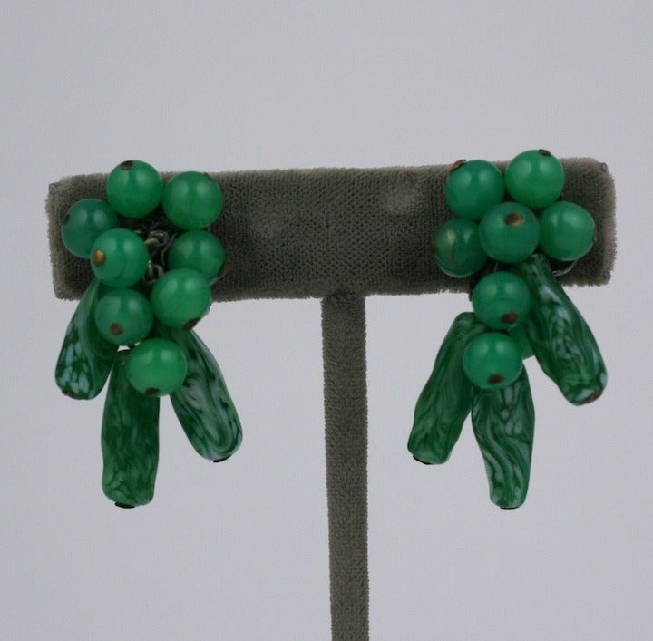Rare Rousselet unusual jade pate de verre earclips circa 1940 composed of handmade round and tube art  glass beads.

Louis Rousselet (1892-1980) was born in Paris and apprenticed at the tender age of eight to M. Rousseau to master the technique of