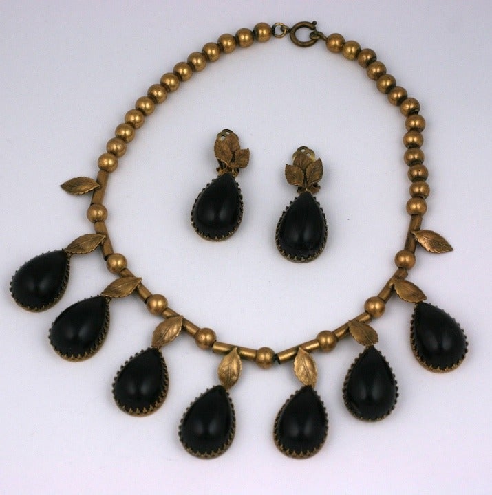 Joseff Hollywood revivalist parure with black bakelite set drops set in signature bronze green gold finish. Earrings with clip back fittings.

Eugene Joseff produced wonderful costume jewelry worn by the stars of Hollywood, and was known for his