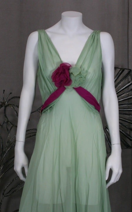 Lovely 1930's Chiffon Art Deco Bias Celadon Gown with 2 toned self flowers and self sashes. Sheer silk chiffon gown slips over head like a bias slip, then sashes tie in back. Matching celadon lace stiffened bolero is cut to follow the sash line
