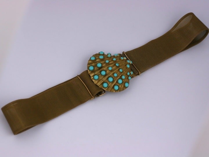 Gilded mesh belt with large scallop shell buckle set with graduated turquoise glass cabochons. Belt 1.5