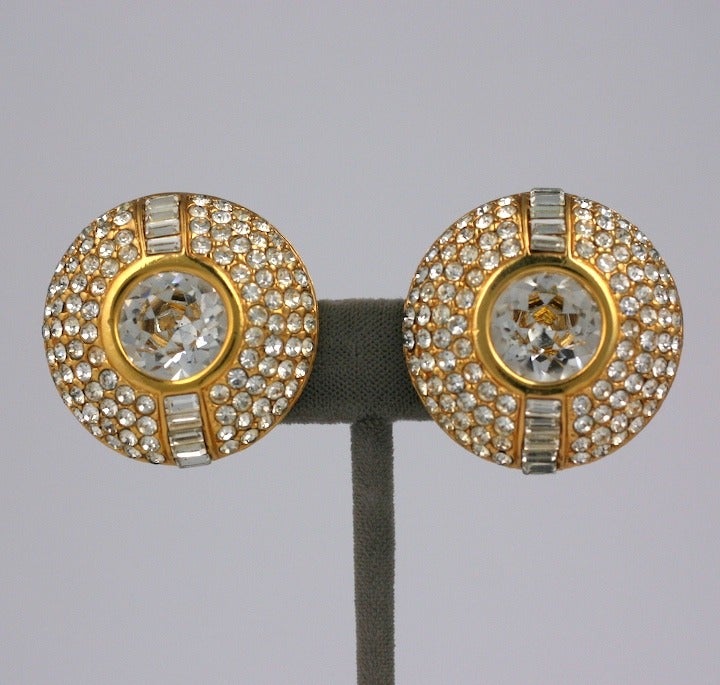 Large goldtoned earrings with pave and baguette work around a single oversized paste. Clip back fittings. USA 1980s.
Excellent condition. Made by Diva, NY. 1.5