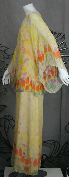 Wonderful Halston Hand Painted Silk Chiffon Tulips 2 piece evening gown. A simple oversized kimono sleeve T overshirt in sheer hand painted chiffon is paired with a simple strap gown in same silk chiffon which is lined. Halstons textiles were always