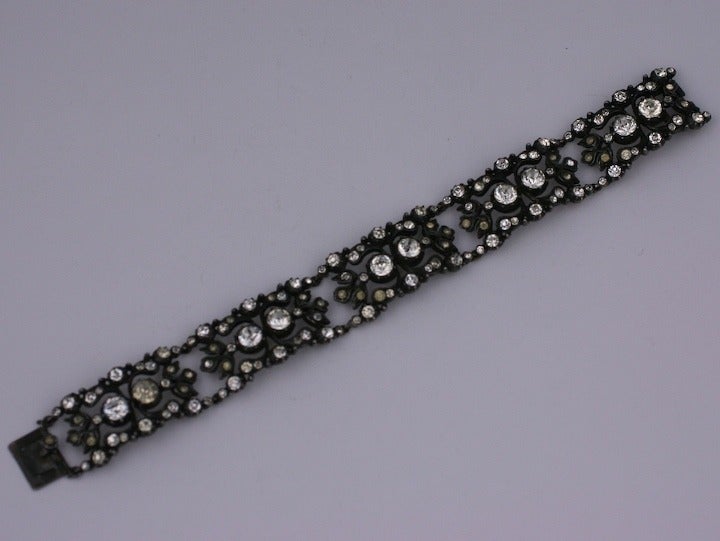 Lovely late Victorian paste bracelet made to resemble rose diamonds on silver. Antique filigreed plaques with varying sized pastes throughout. Beautiful quality. France 1880's. 7