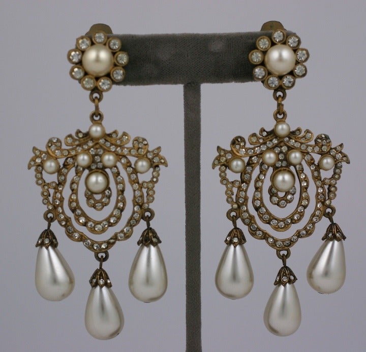 Early gilt metal crystal paste and faux pearl long Girandole earrings signed KJL. 1960s USA.
Excellent condition.