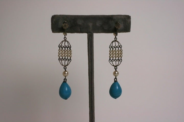1930s screw back pearl and  turquoise pate de verre earrings from Louis Rousselet.

Louis Rousselet (1892-1980) was born in Paris and apprenticed at the tender age of eight to M. Rousseau to master the technique of lamp-work beads. 