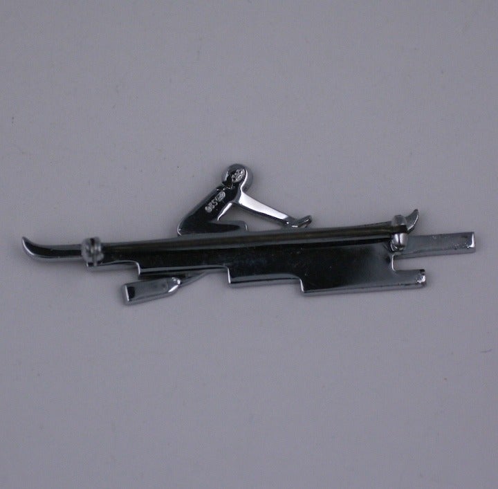 Charming Art Deco paste novelty sporting brooch from the 1930's depicting a rower in motion set with paste baguettes and black enamel. Set in sterling, made in Germany circa 1930's. 2.75