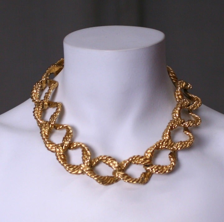 Attractive and large twisted gilt chain link necklace from the 1980's, USA.
 17