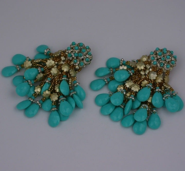 Amazing hand woven beaded earrings made by Coppola Toppo of Italy. These oversized dramatic earrings are made with crystal set rondels, czech glass beads and faux turquoise resin drops. All the beads are woven onto a ribbed gold bead fretwork on the